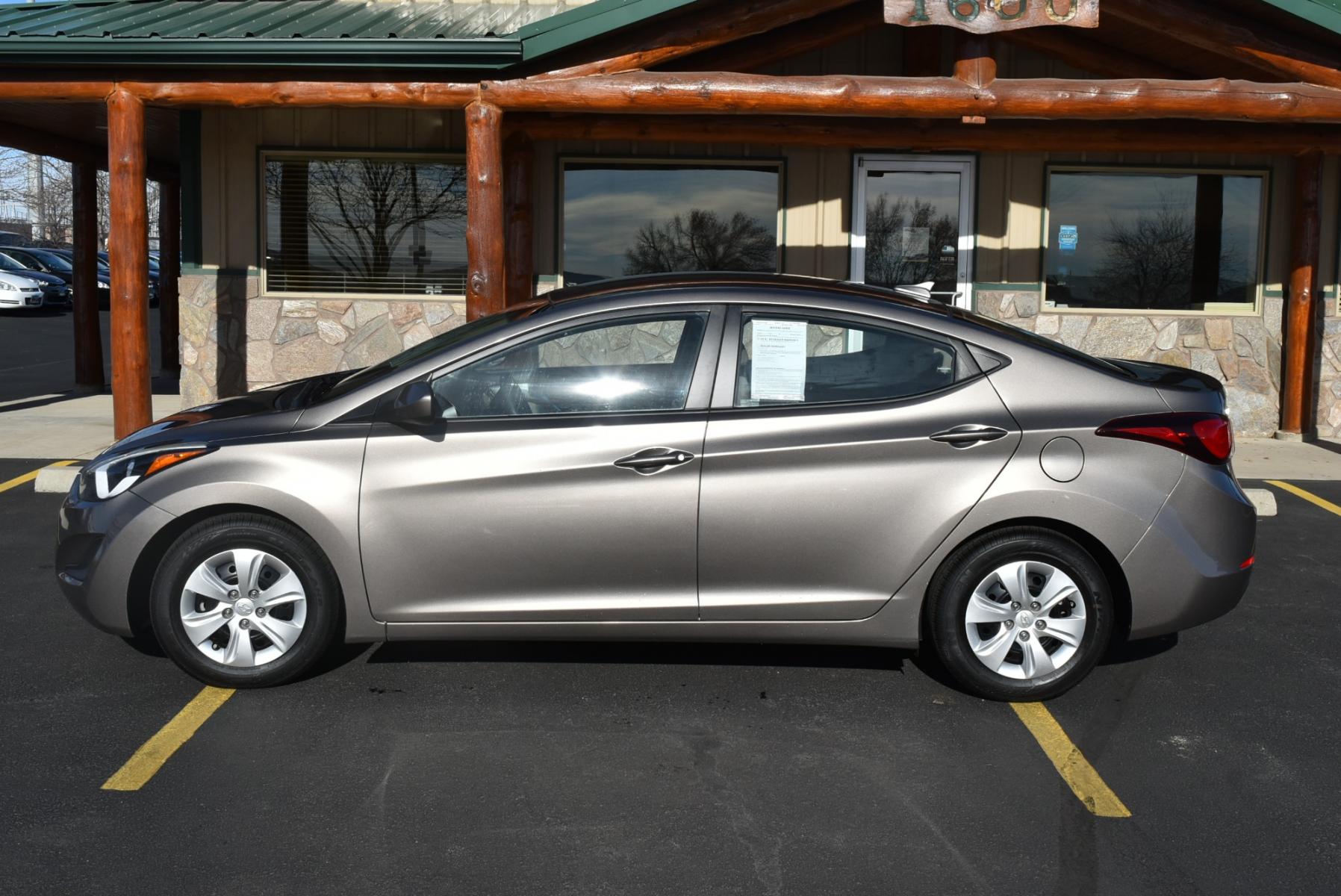 2016 Bronze Hyundai Elantra SE (5NPDH4AE3GH) with an 1.8L 4 Cyl engine, 6-Speed Automatic transmission, located at 1600 E Hwy 44, Rapid City, SD, 57703, (605) 716-7878, 44.070232, -103.171410 - Photo #3